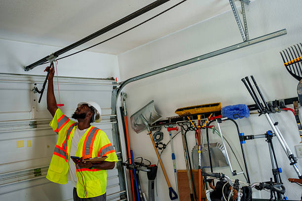 Professional Garage Door Installation technician working in Malta, IL